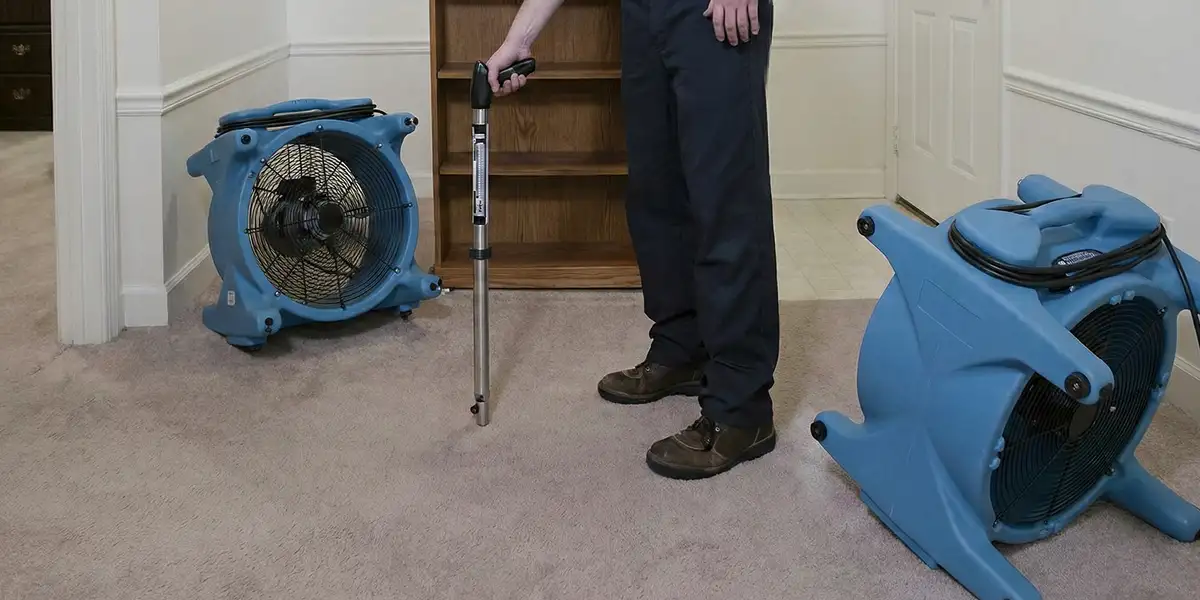emergency water removal equipment deployed to dry a flooded residential interior in Omaha, NE