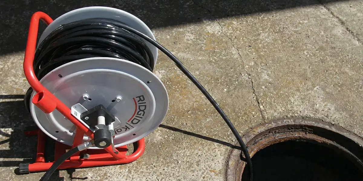 sewer rodding equipment prepared to clear clogged sewer lines in Omaha, NE
